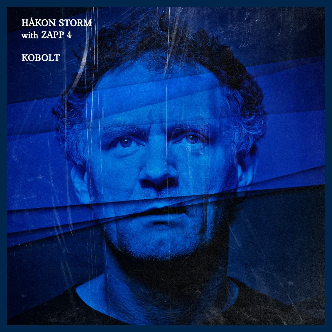 Blue-tinted portrait of a man with tousled hair looking intensely at camera, overlaid with geometric lines and rain effects creating a moody, storm-like atmosphere.