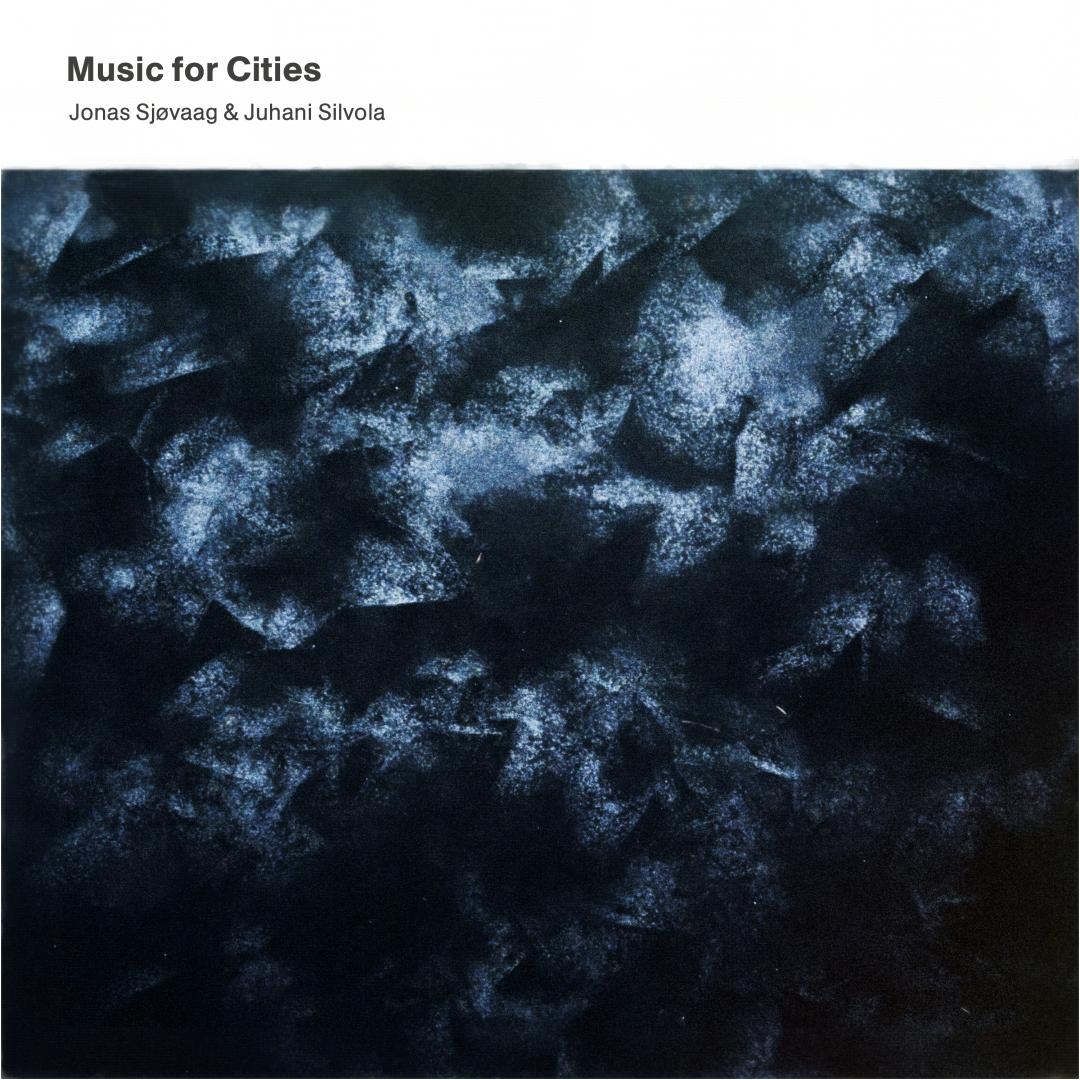 Dark blue textured album cover with abstract crystalline or rocky formations creating moody, atmospheric patterns for "Music for Cities