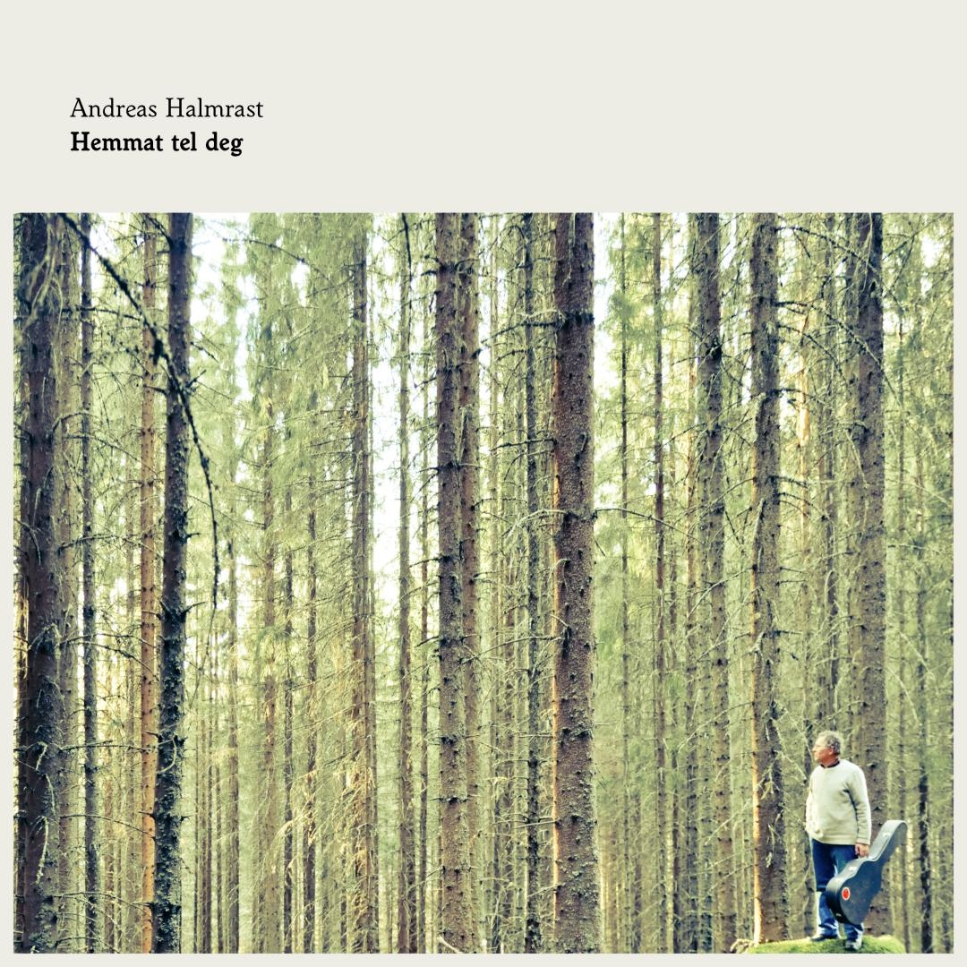 Book cover showing dense forest of tall pine trees in muted greens and browns, with small figure of man in white shirt and jeans among the towering trunks.