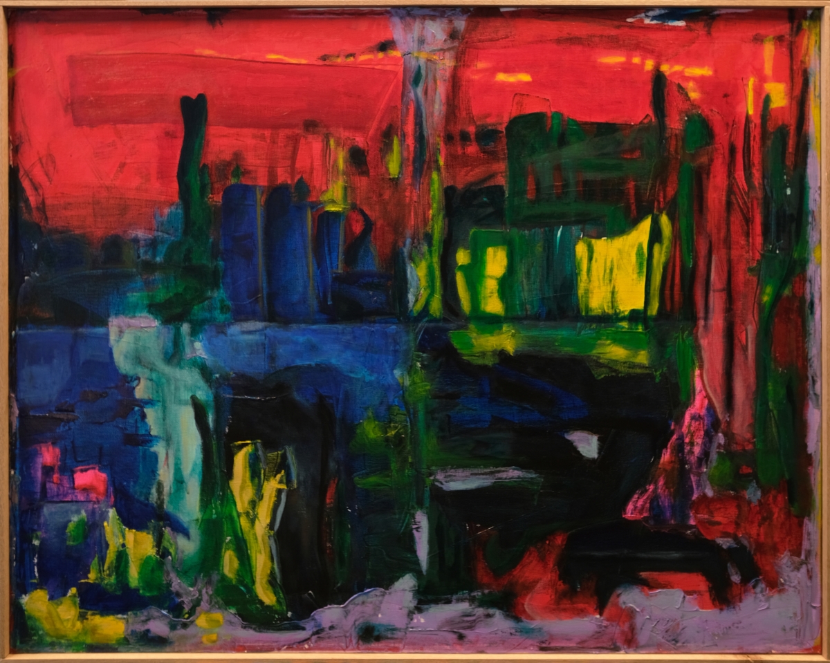 Abstract expressionist painting with bold red upper section, blue lower left, and dark green central forms, framed in natural wood, creating dynamic color blocks and gestural brushstrokes.