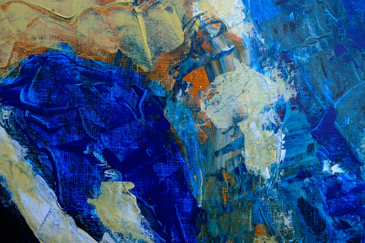 Abstract painting with bold blue brushstrokes, white highlights, and orange-brown accents on textured canvas creating dynamic movement and depth