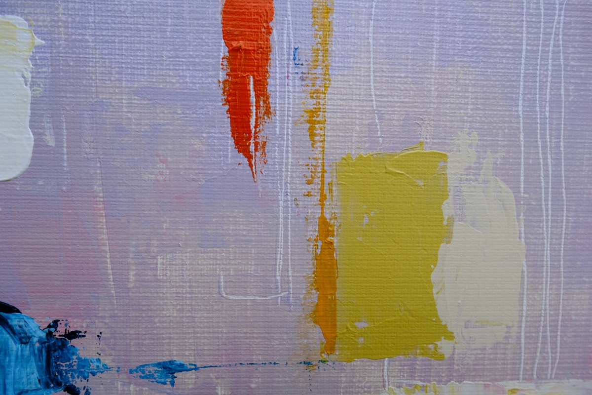 Close-up of abstract painting with lavender background, orange drip, ochre stripe, mustard yellow block, and blue brushstrokes in corner.