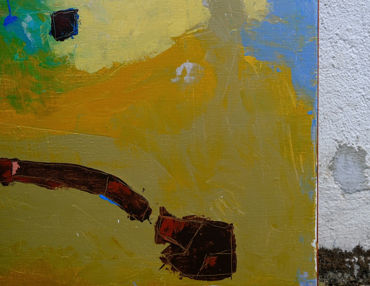 Abstract painting with ochre and olive tones, a dark reddish-brown arm-like form, blue accents, and a textured white wall edge visible at right.